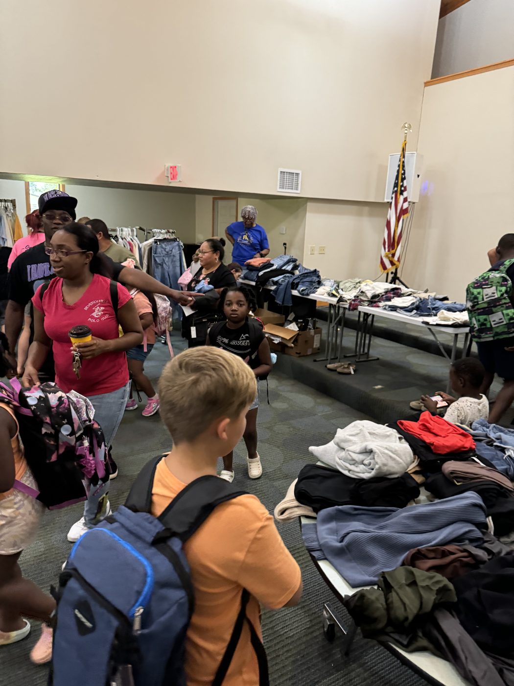 Families gathered for the annual backpack and school supplies giveaway