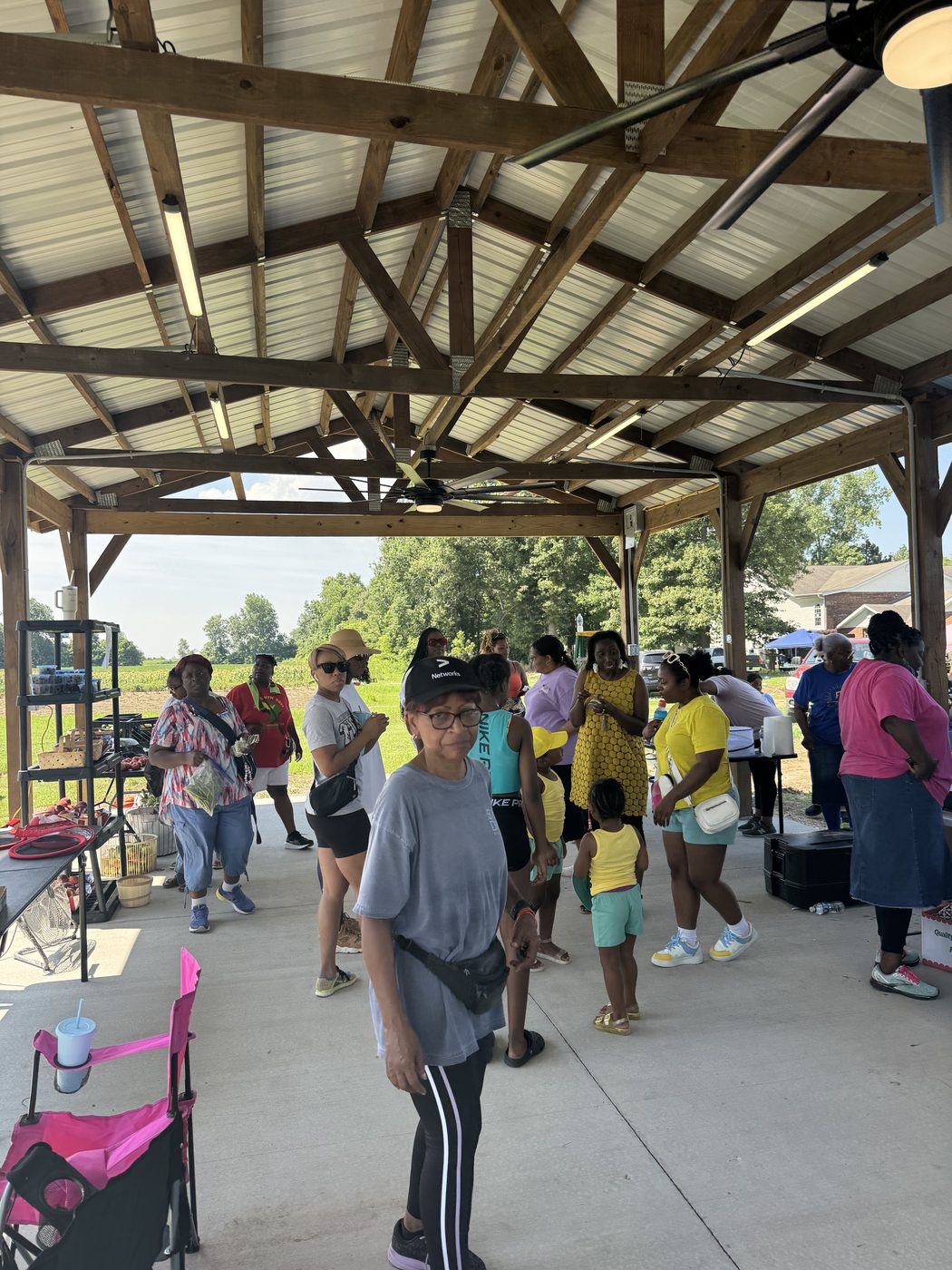 Community gathered under the pavilion at STAN's Market