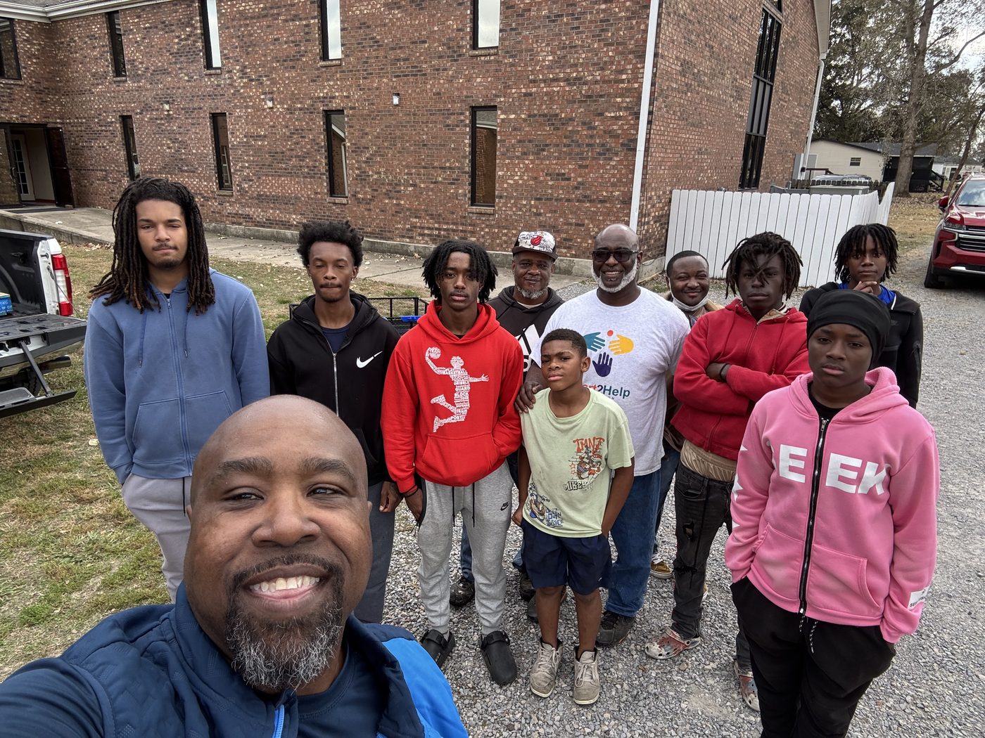 Men and youth gathered for mentorship and community building