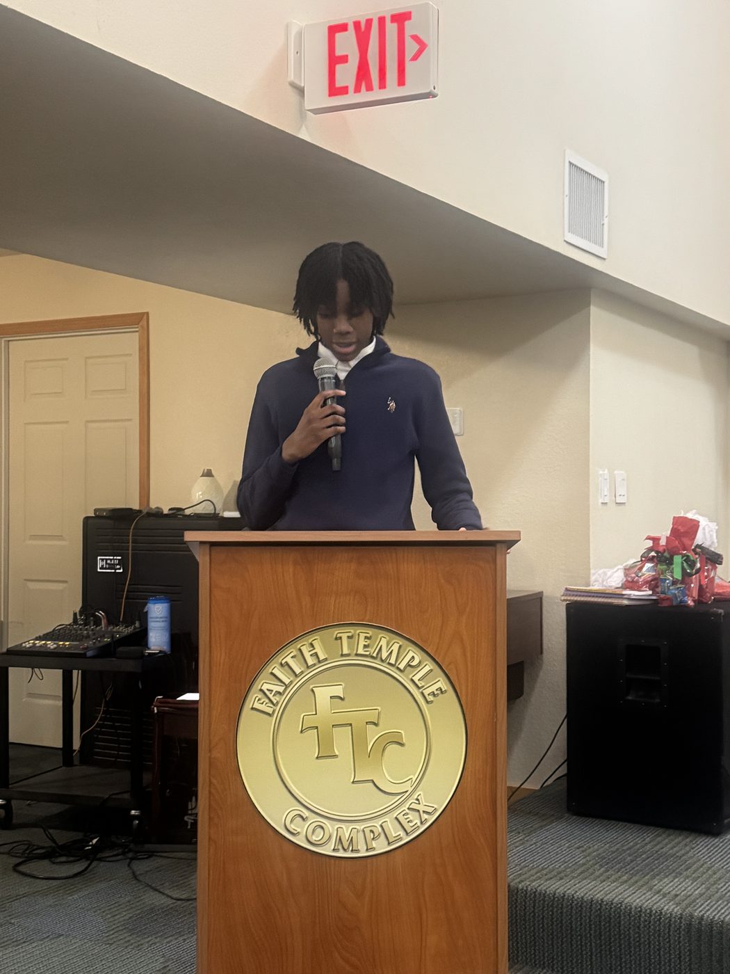 Young person speaking at FTC podium